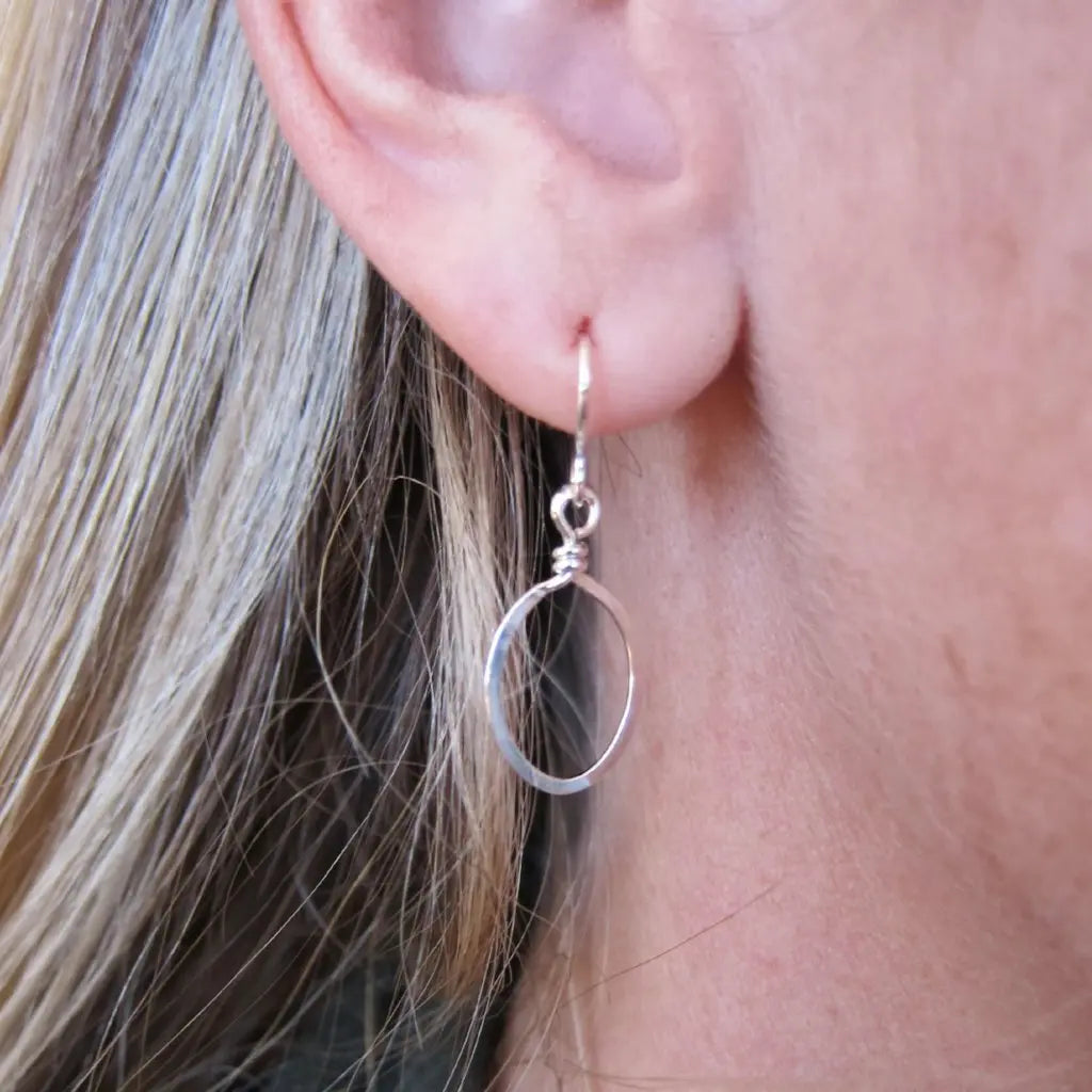 Small forged oval earrings