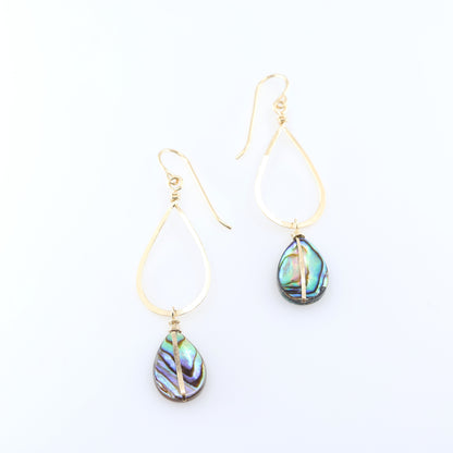 A pair of gold teardrop dangle earrings with iridescent abalone shell drops, displayed on a clean white background.